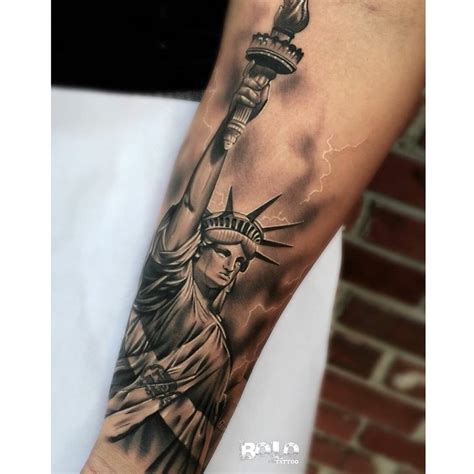 statue of liberty forearm tattoo.